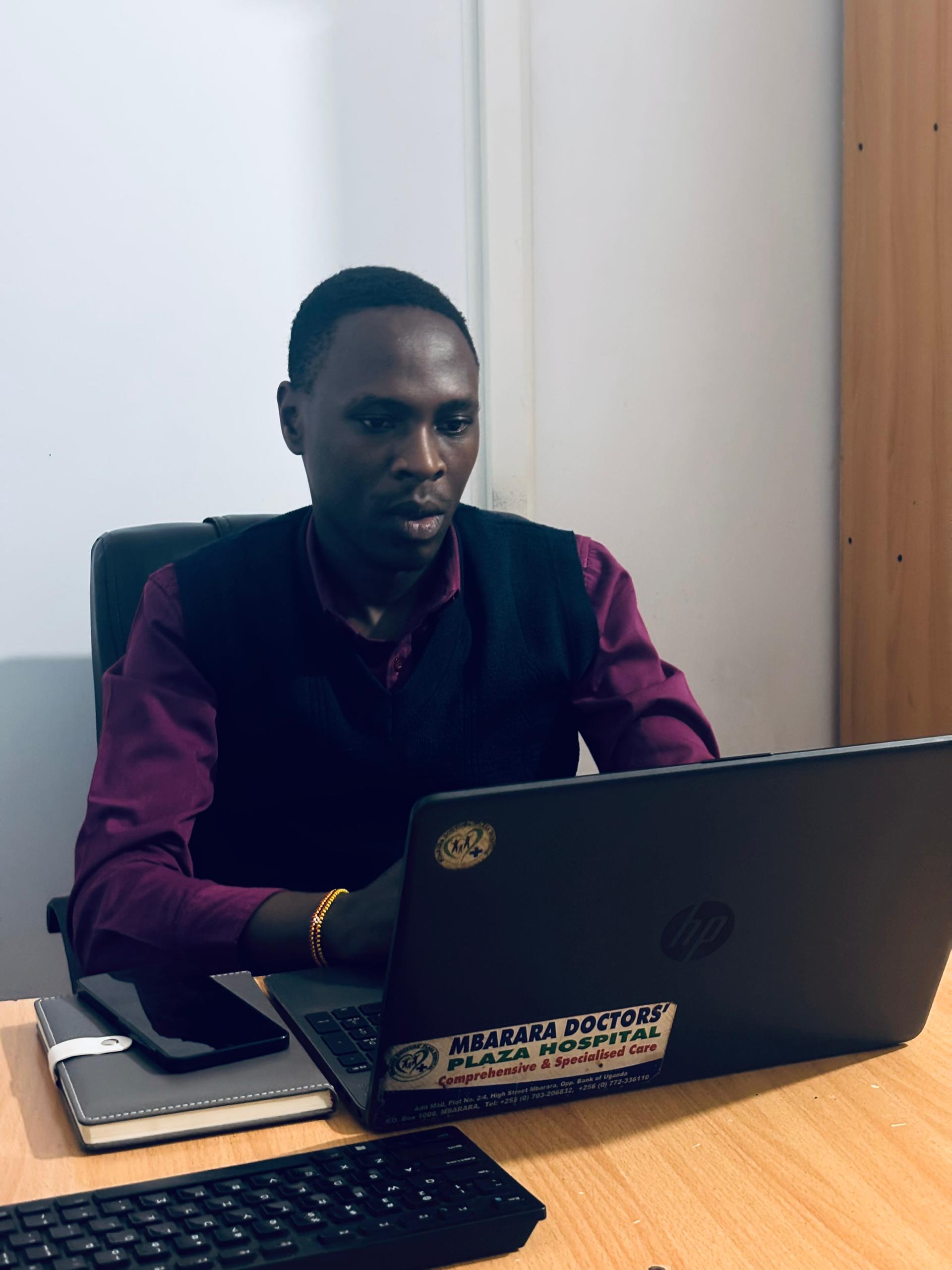 Mr Kamusiime Peter